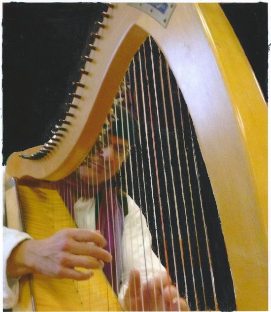 musician David Helfand playing celtic harp